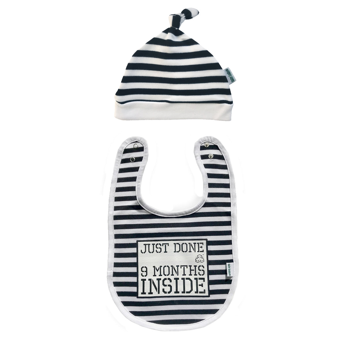 Baby hat and bib set with black and white stripes. Bib with slogan Just Done 9 Months Inside.